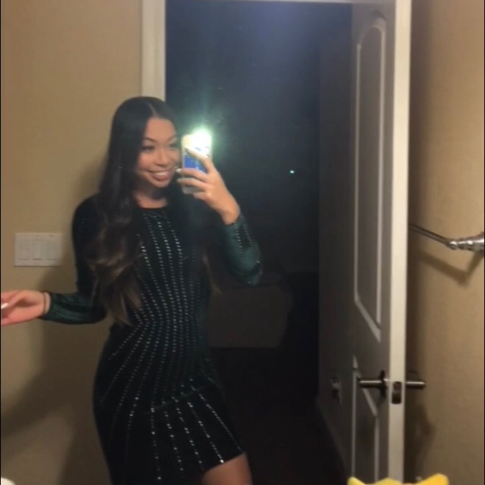 Emerald green velvet dress